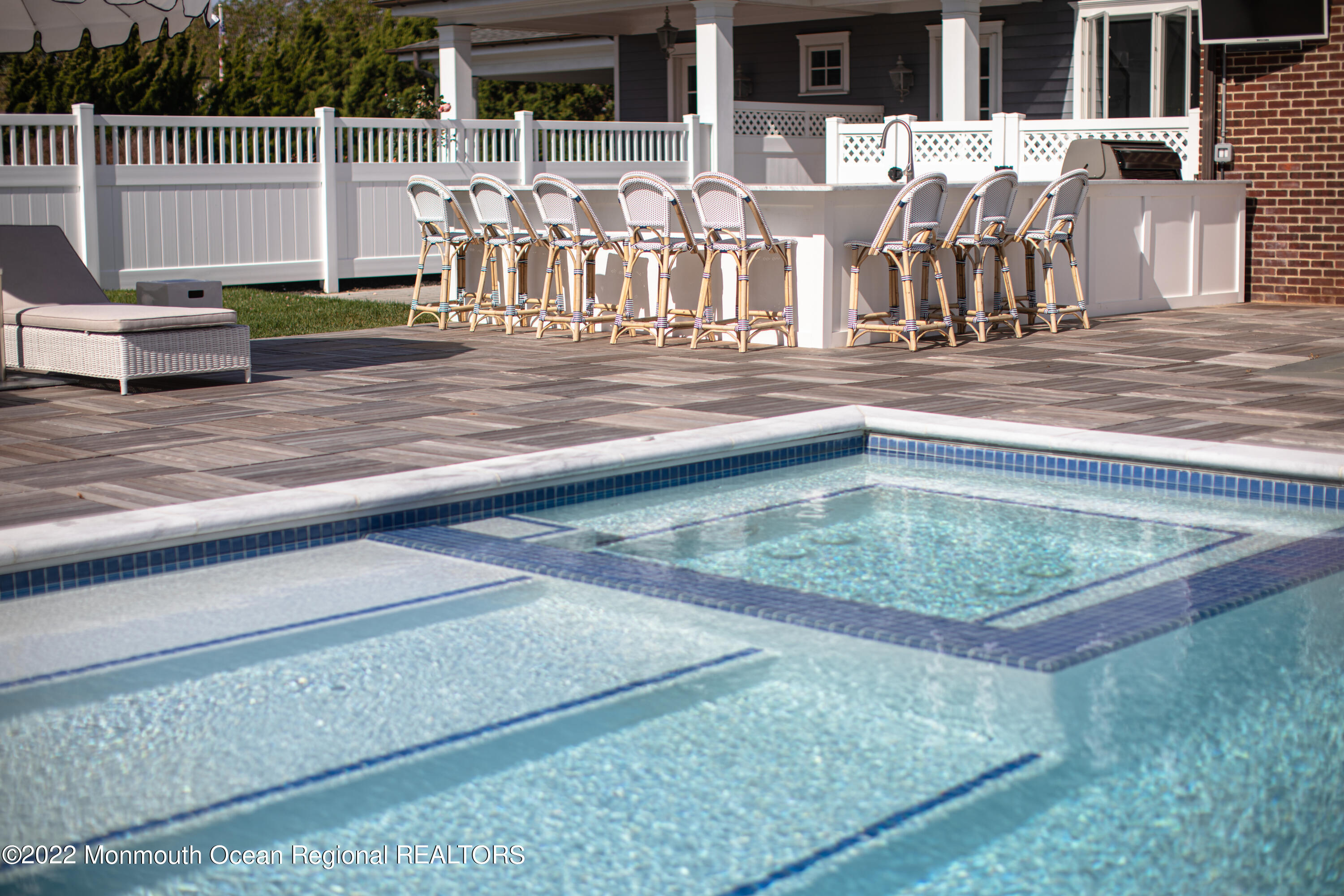 15 Madison Avenue Spring Lake, NJ 07762 - Photo 8 of 53 a view of a swimming pool with outdoor seating