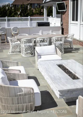 a kitchen with a table and chairs in it