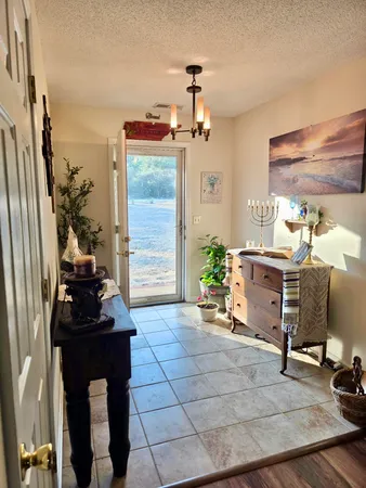 a room with furniture and a window