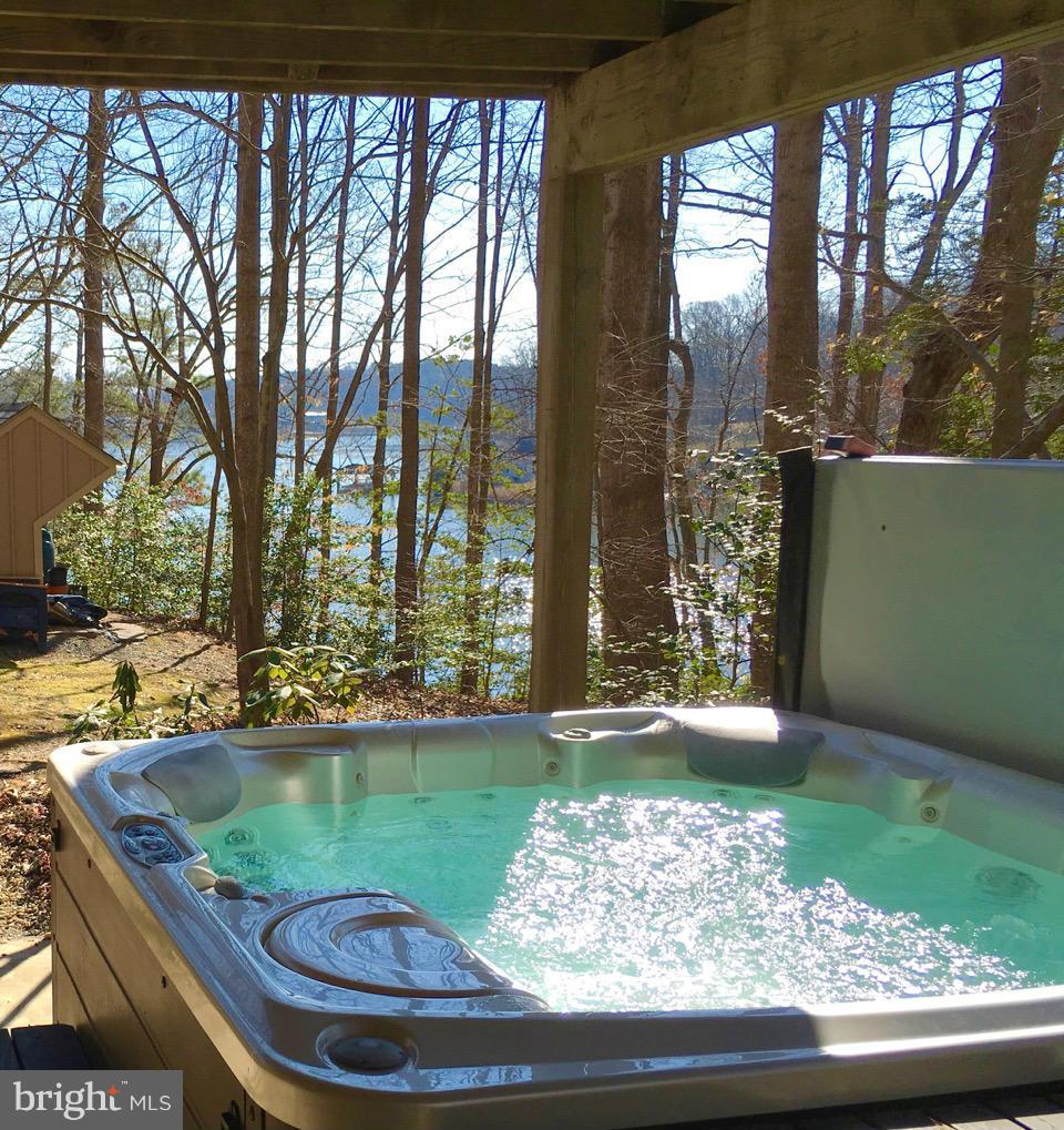 8442 Mackall Road St. Leonard, MD 20685 - Photo 23 of 30 Hot tub over looking the creek