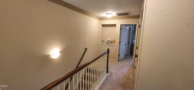 a view of hallway with stairs