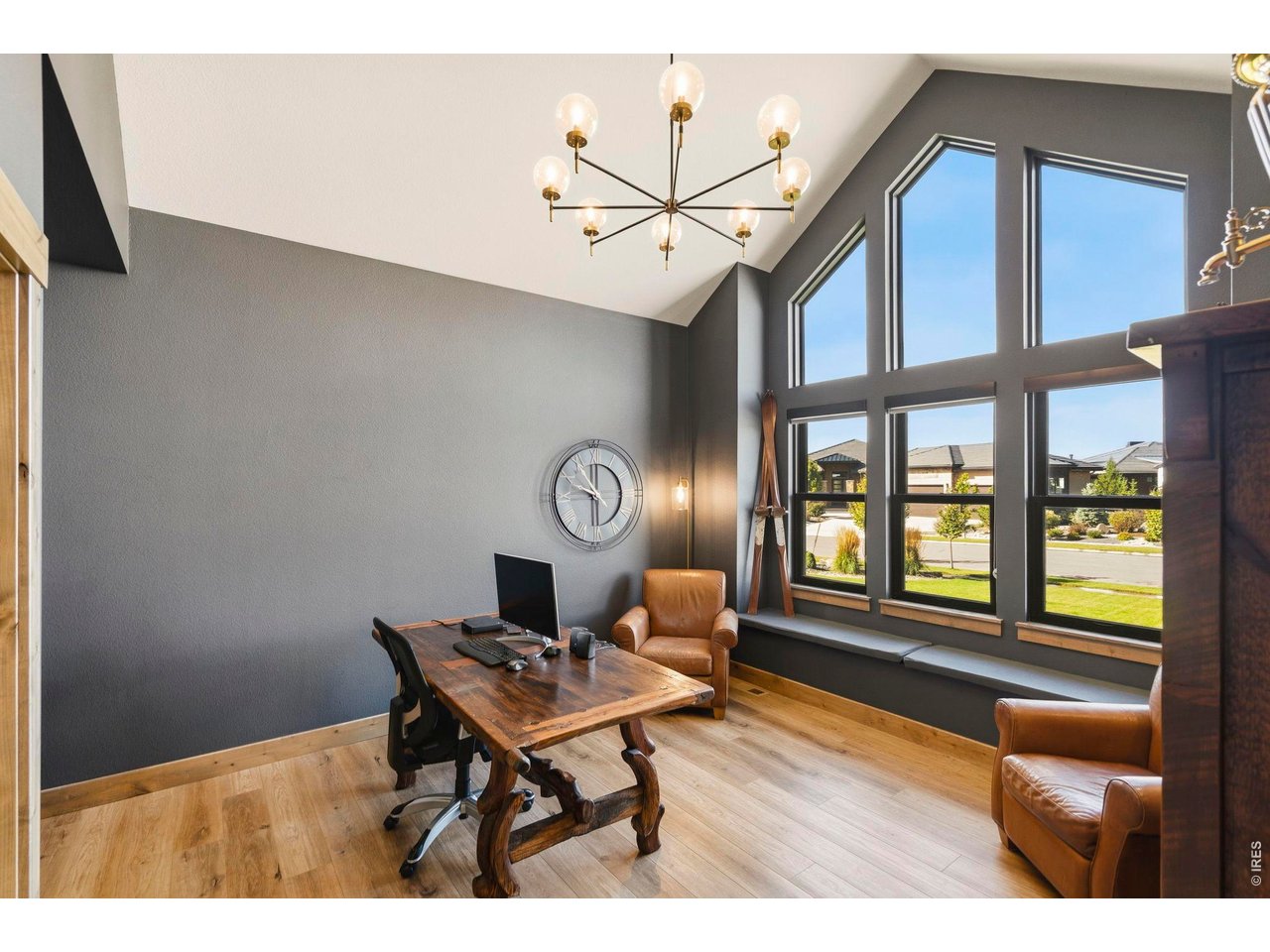 2734 Southwind Road Berthoud, CO 80513 - Photo 5 of 50 Main Level Office - Window Seat and walk-in Closet - 14x17 - Wood Floors and Vaulted Ceiling