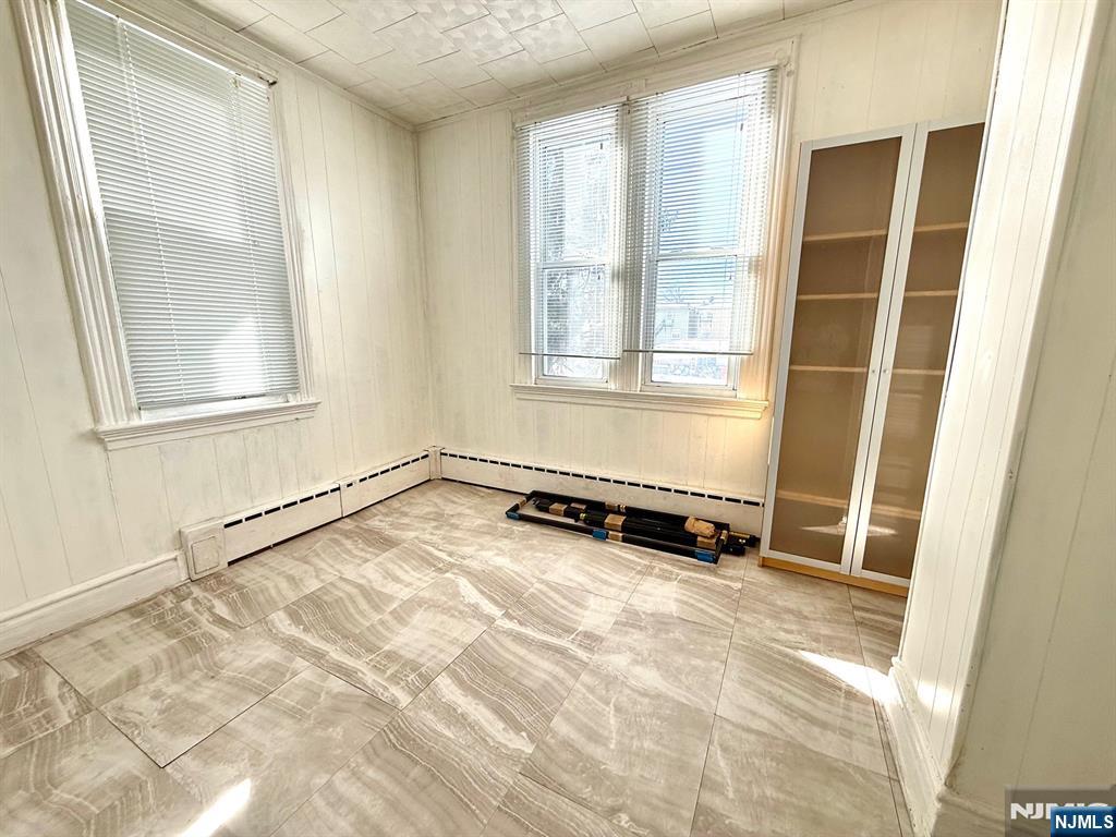 405 7th Street Harrison, NJ 07029 - Photo 12 of 21 a view of an empty room with a window