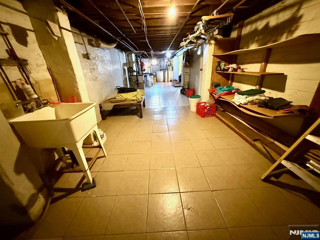 405 7th Street Harrison, NJ 07029 - Photo 14 of 21 a view of a room with gym equipment