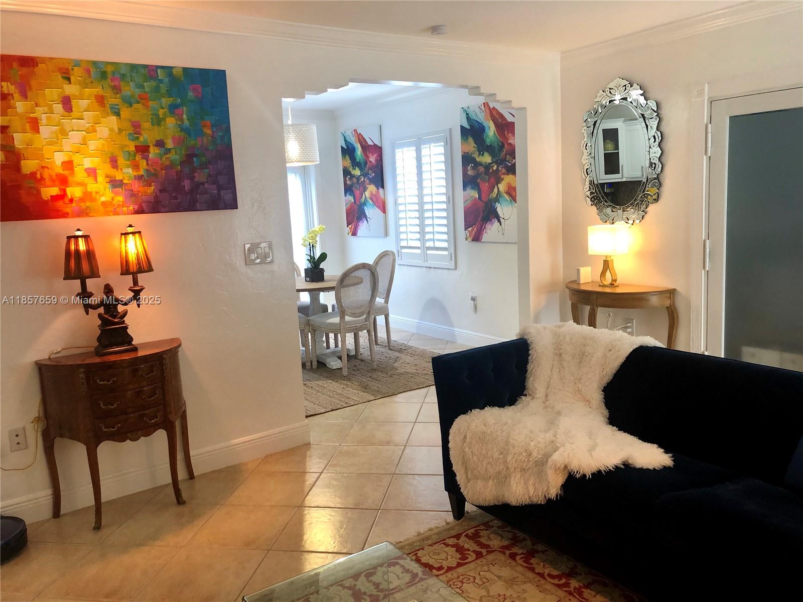 6450 Southwest 19th Street West Miami, FL 33155 - Photo 15 of 42 a living room with furniture and a window