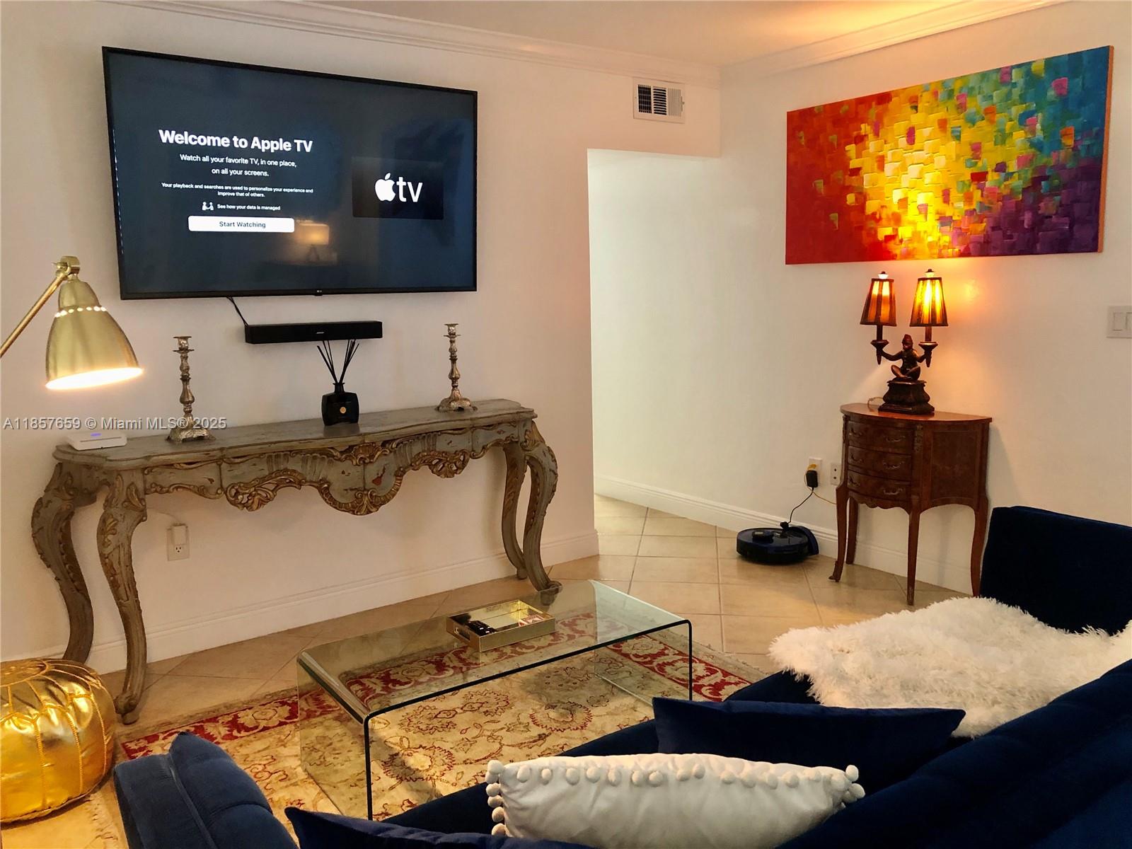 6450 Southwest 19th Street West Miami, FL 33155 - Photo 21 of 42 a room with furniture and screen tennis