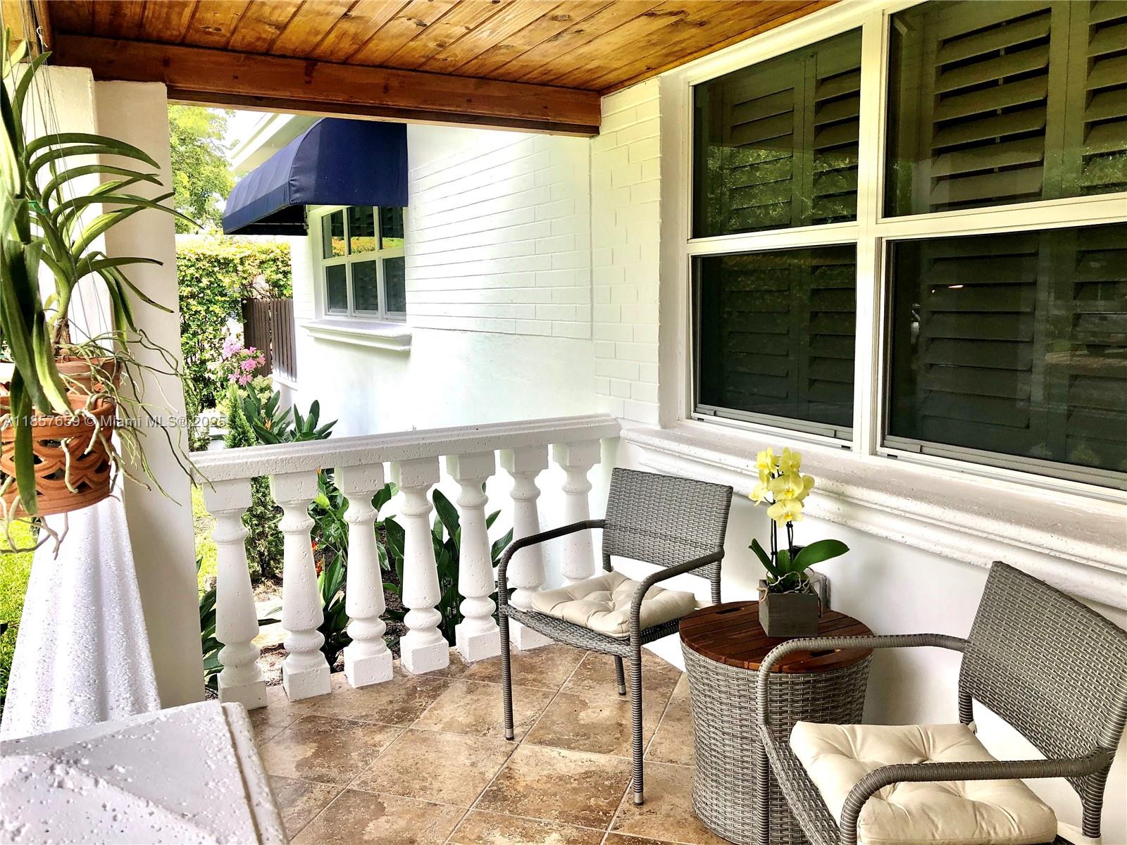 6450 Southwest 19th Street West Miami, FL 33155 - Photo 3 of 42 a view of balcony with furniture