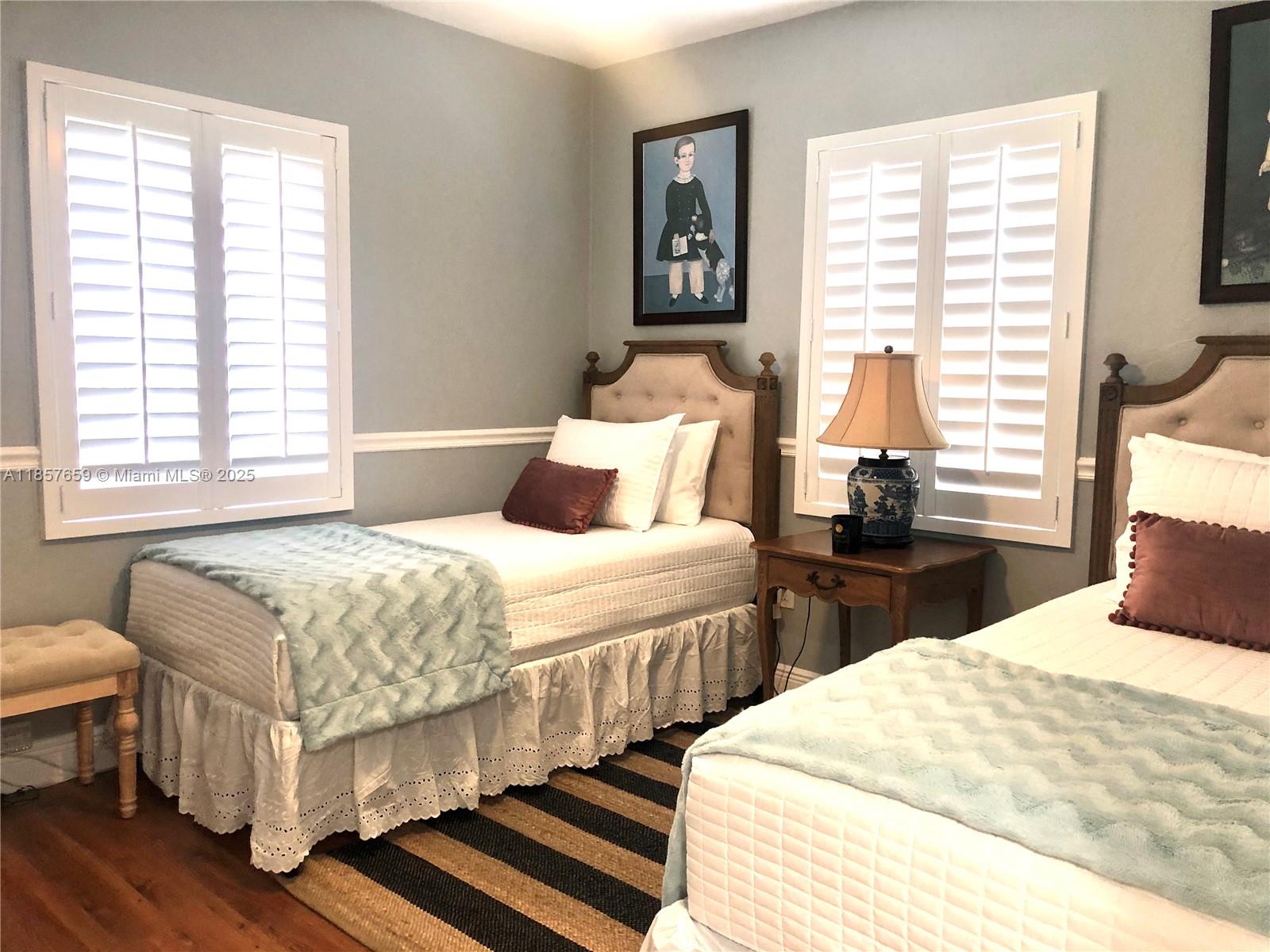 6450 Southwest 19th Street West Miami, FL 33155 - Photo 33 of 42 a bedroom with bed and a window