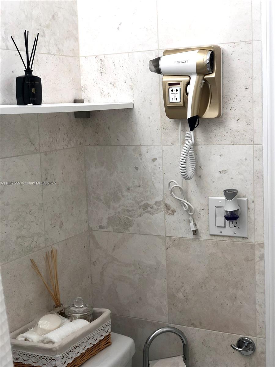 6450 Southwest 19th Street West Miami, FL 33155 - Photo 38 of 42 a bathroom with a toilet