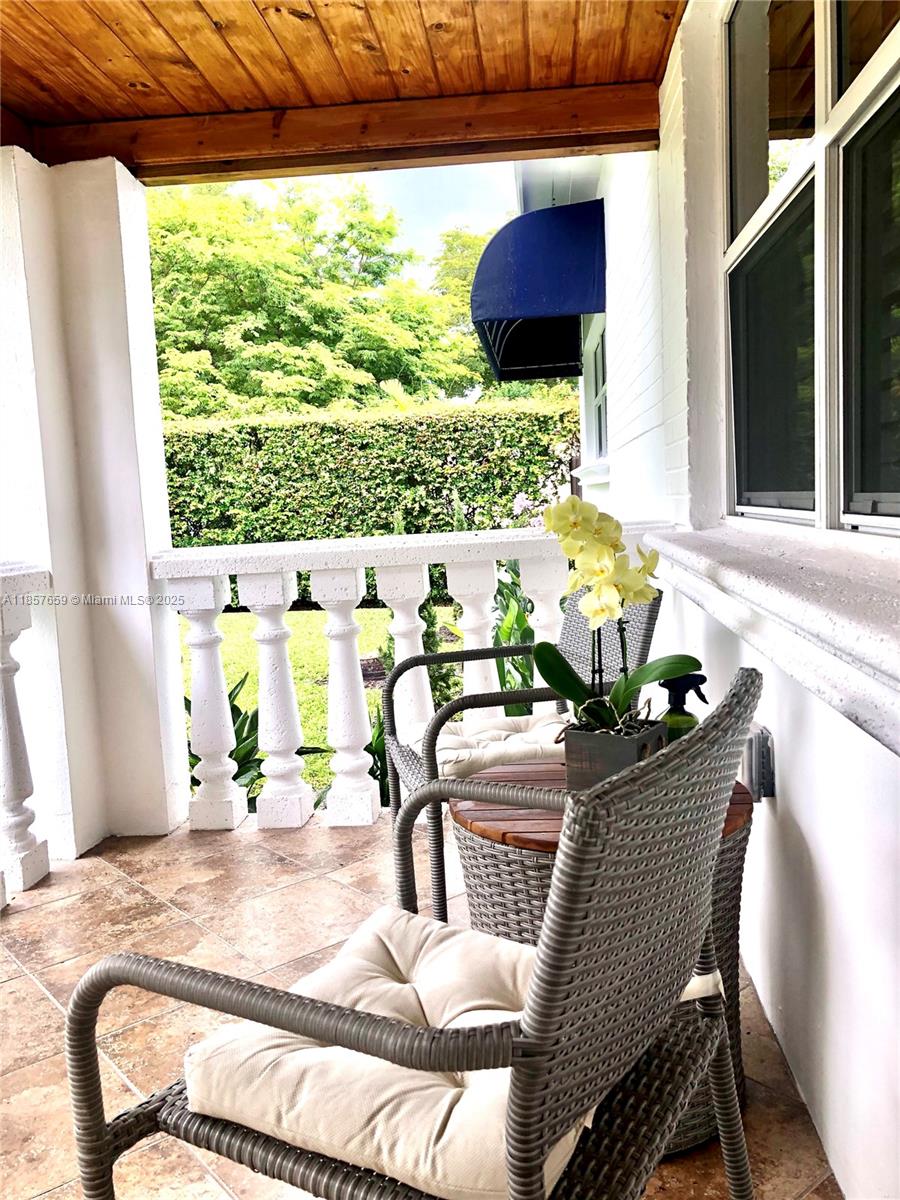 6450 Southwest 19th Street West Miami, FL 33155 - Photo 4 of 42 a dining room with furniture and a floor to ceiling window