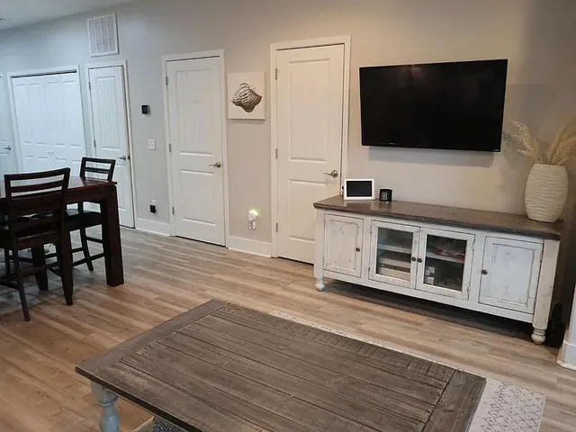 a kitchen with stainless steel appliances a sink stove and refrigerator