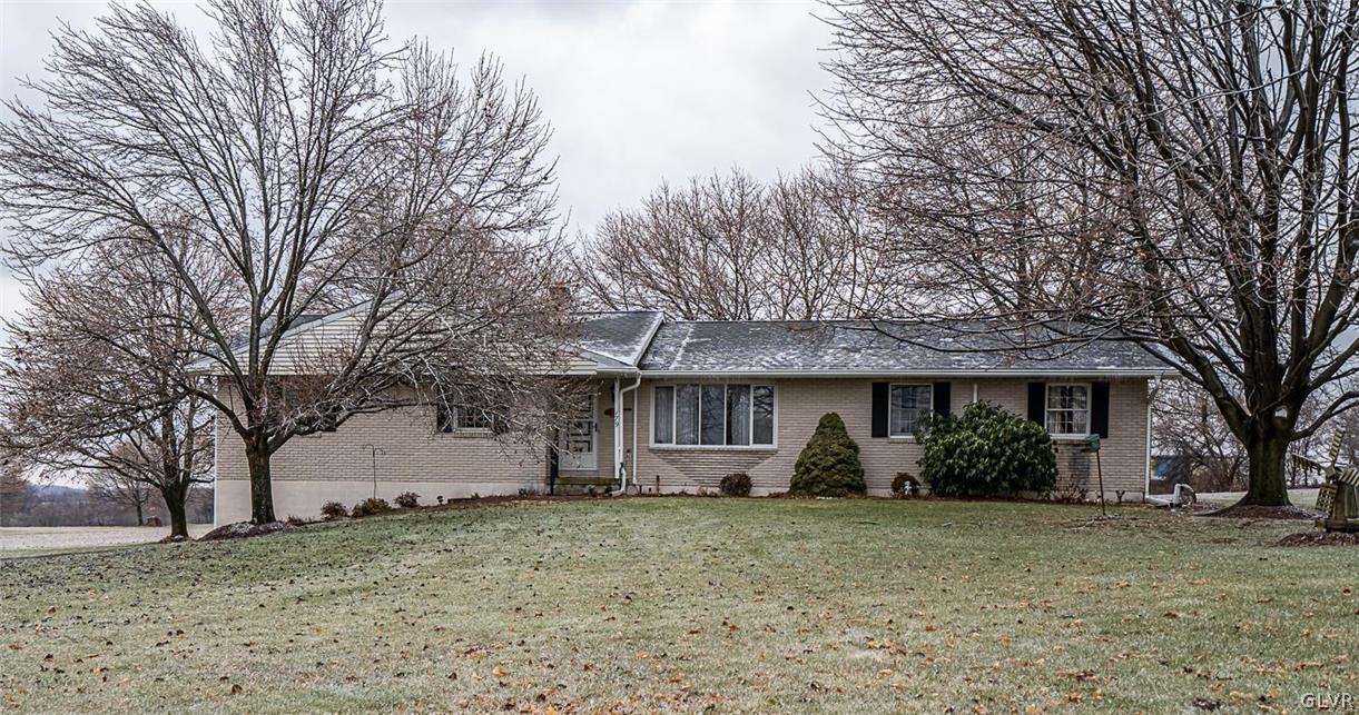 a front view of house with yard