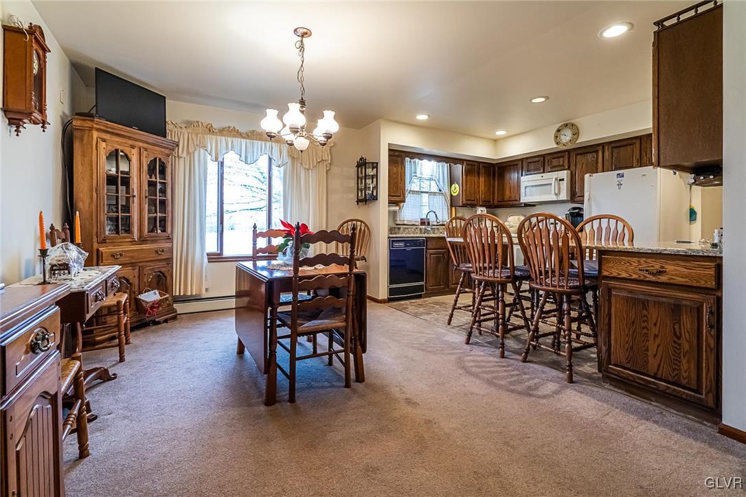179 Kemmerer Road Nazareth, PA 18064 - Photo 18 of 38 a view of a livingroom with furniture a rug a chandelier and window
