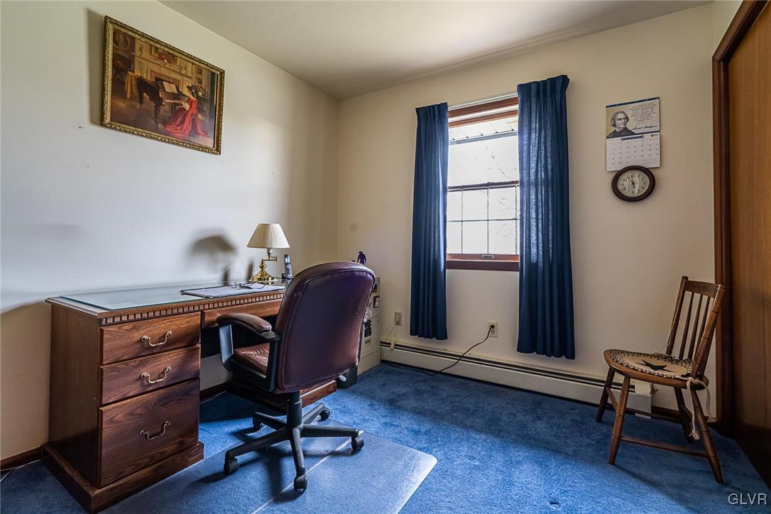 179 Kemmerer Road Nazareth, PA 18064 - Photo 28 of 38 a view of a workspace with furniture and a window