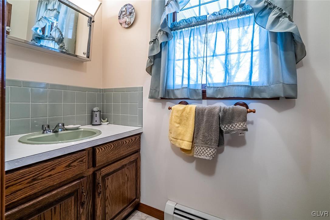 179 Kemmerer Road Nazareth, PA 18064 - Photo 29 of 38 a bathroom with a sink and a mirror