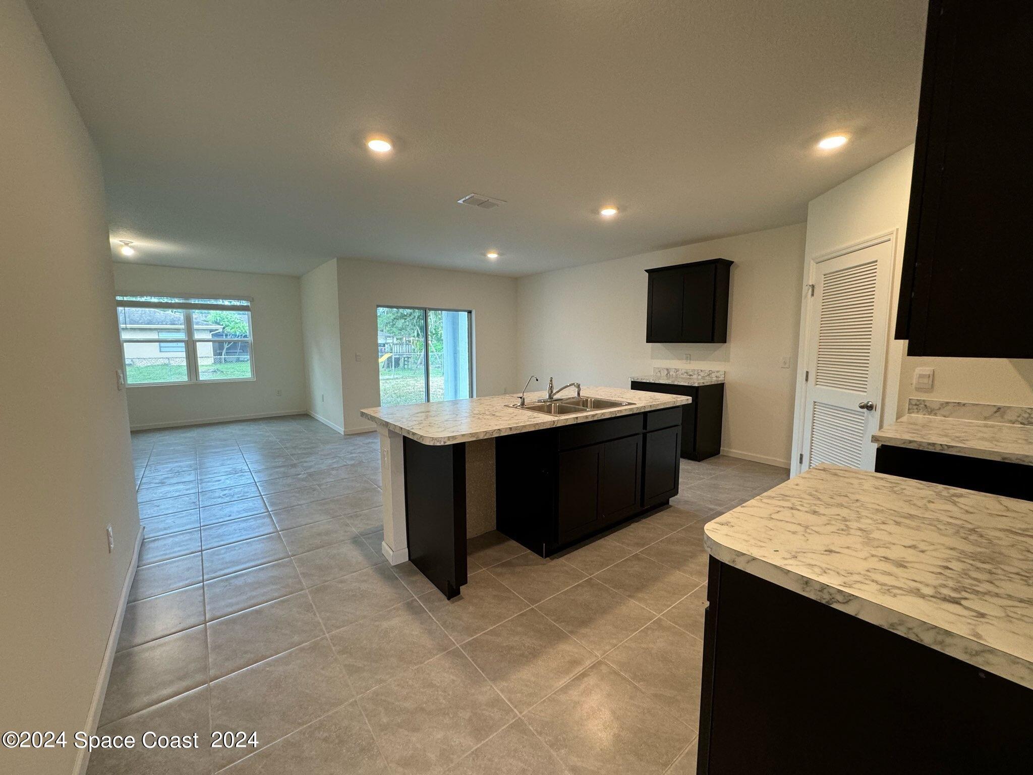 435 Oakleaf Street Southwest Palm Bay, FL 32908 - Photo 3 of 44 9. 435 Oakleaf - Kitchen.1