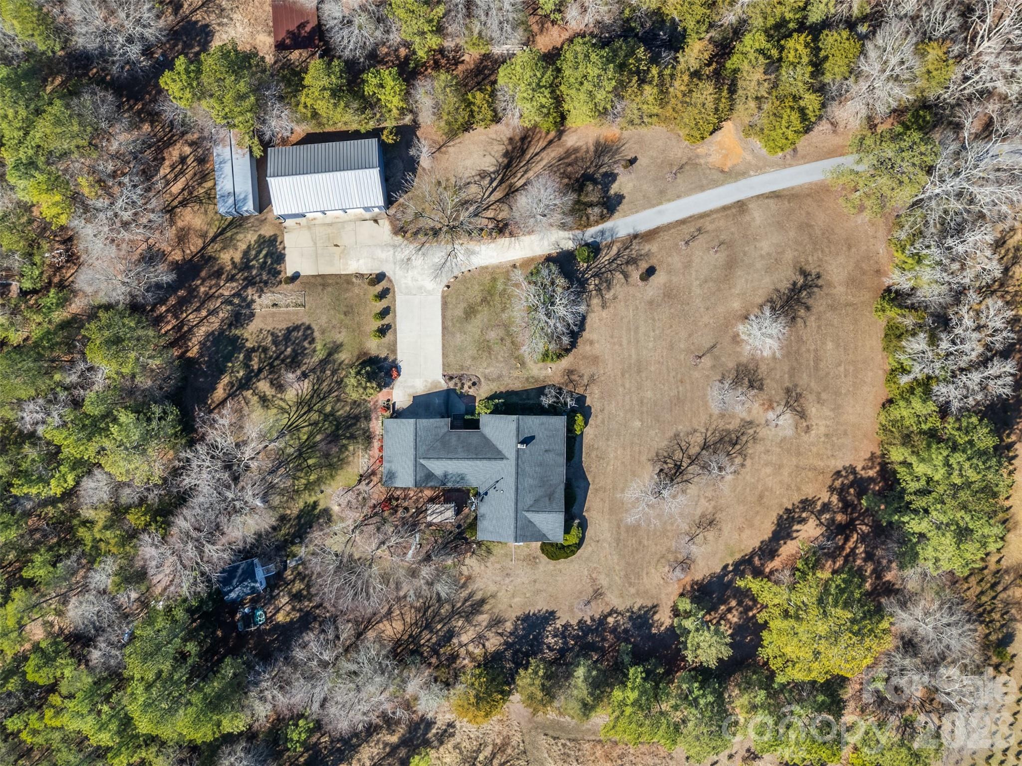 6330 Richburg Road Great Falls, SC 29055 - Photo 4 of 20 an aerial view of a house with a yard and trees