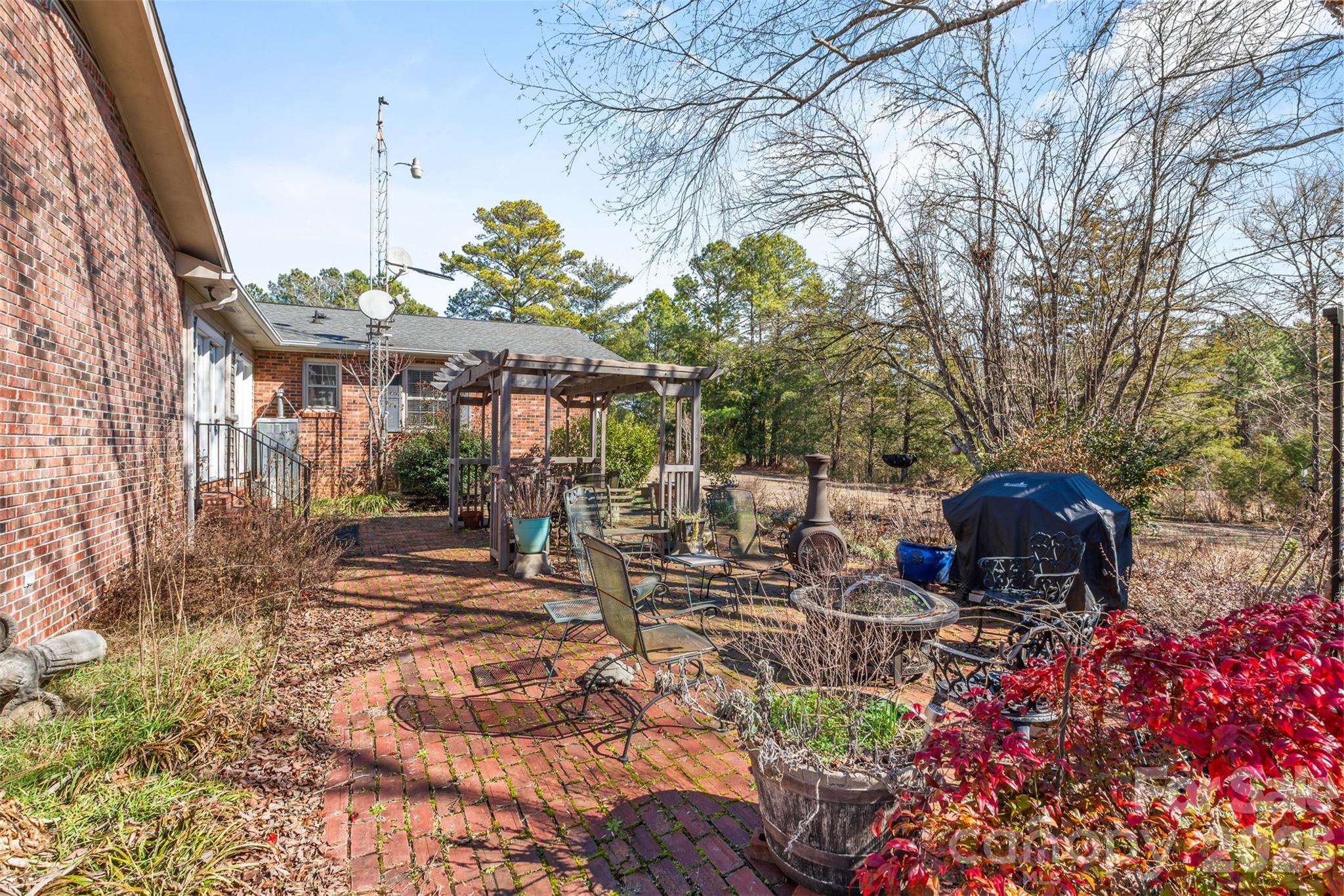 6330 Richburg Road Great Falls, SC 29055 - Photo 8 of 20 a view of a patio with table and chairs and potted plants