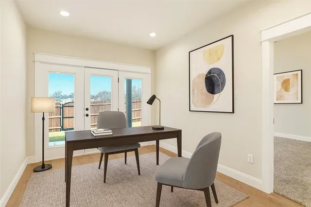 a view of a dining room with furniture