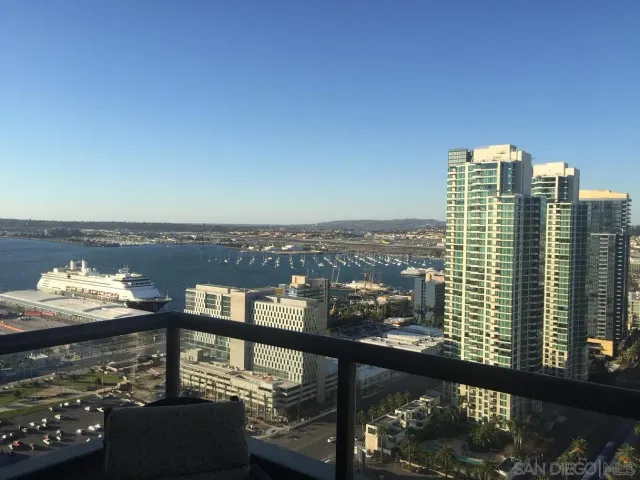a view of a balcony with city view