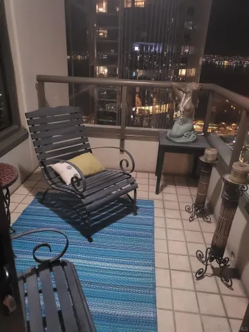 a view of a terrace with seating area