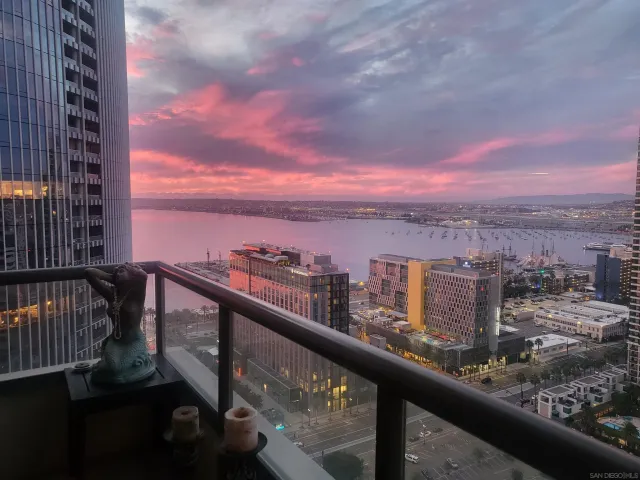 a view of a city skyline from a balcony