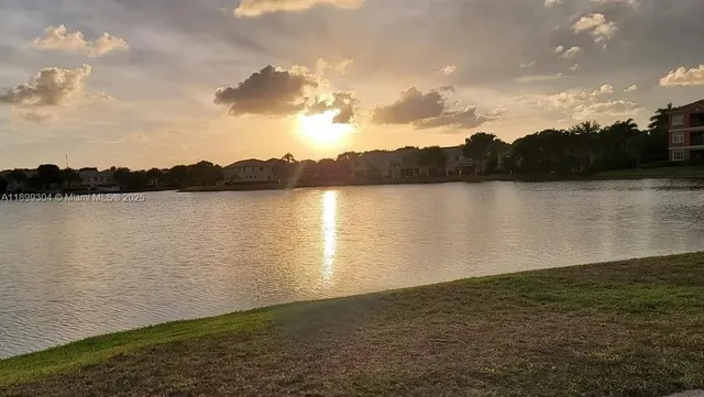 a view of a lake from a yard