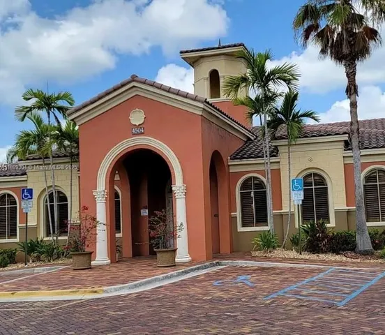 front view of a house with a street