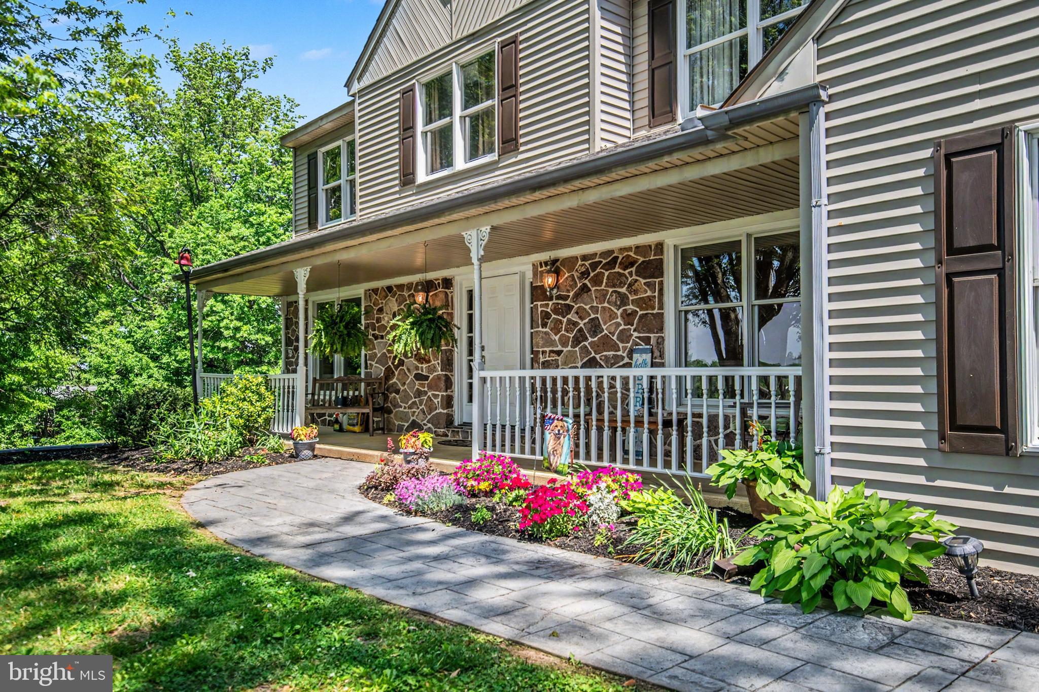 206 Reitnour Road Spring City, PA 19475 - Photo 4 of 55 Covered front porch with landscaping