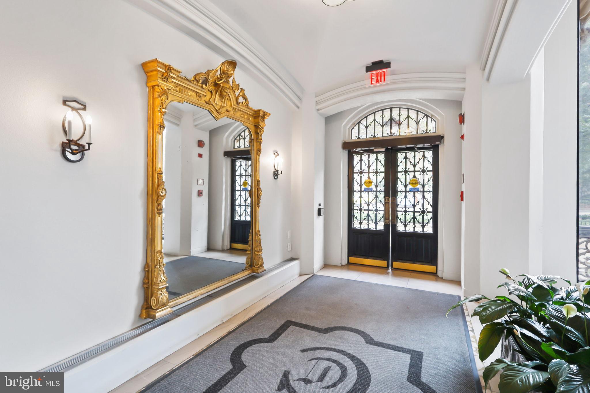 1701 16th Street Northwest, Unit 706 Washington, DC 20009 - Photo 21 of 29 Elegant entryway with ornate mirror.