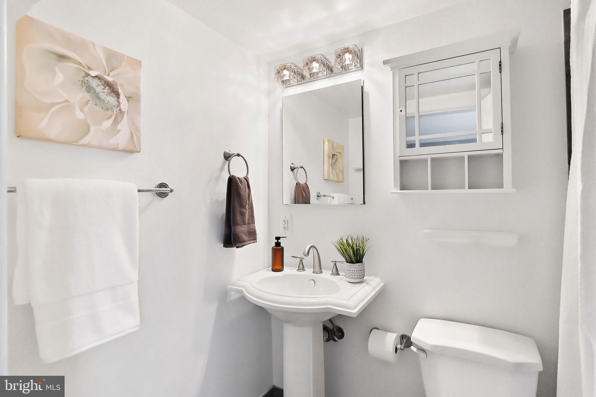 1701 16th Street Northwest, Unit 706 Washington, DC 20009 - Photo 10 of 29 Chic bathroom with modern elegance.