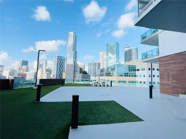 a view of a city with tall buildings