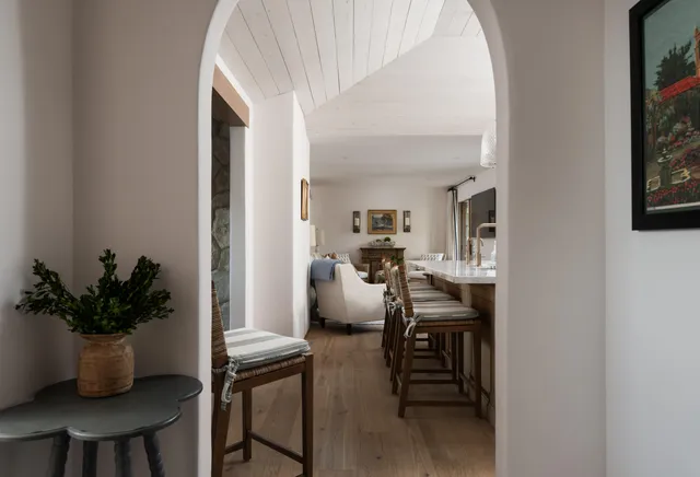 a view of a workspace with furniture