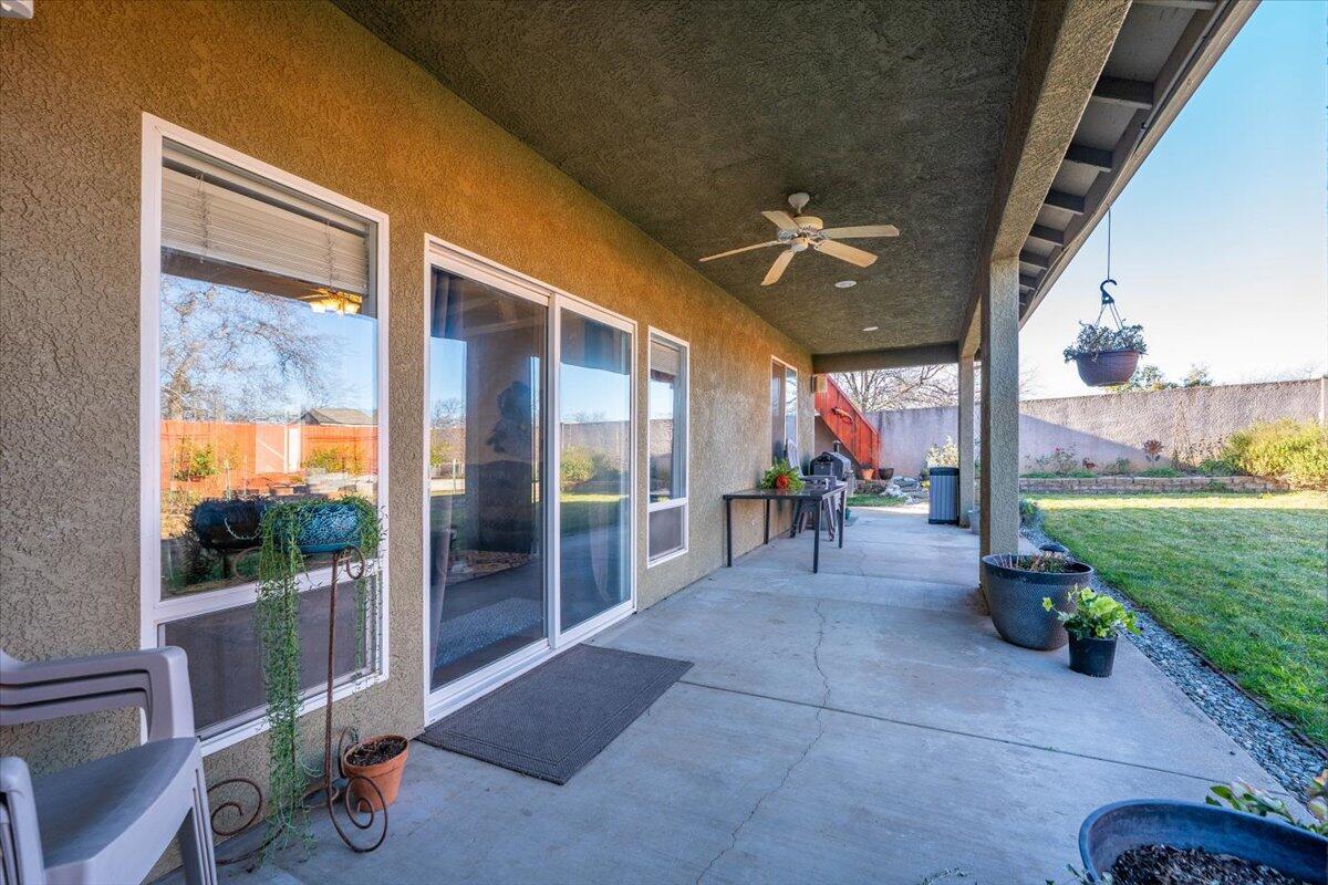 2122 Edinburgh Way Redding, CA 96003 - Photo 30 of 61 a view of a porch and garden