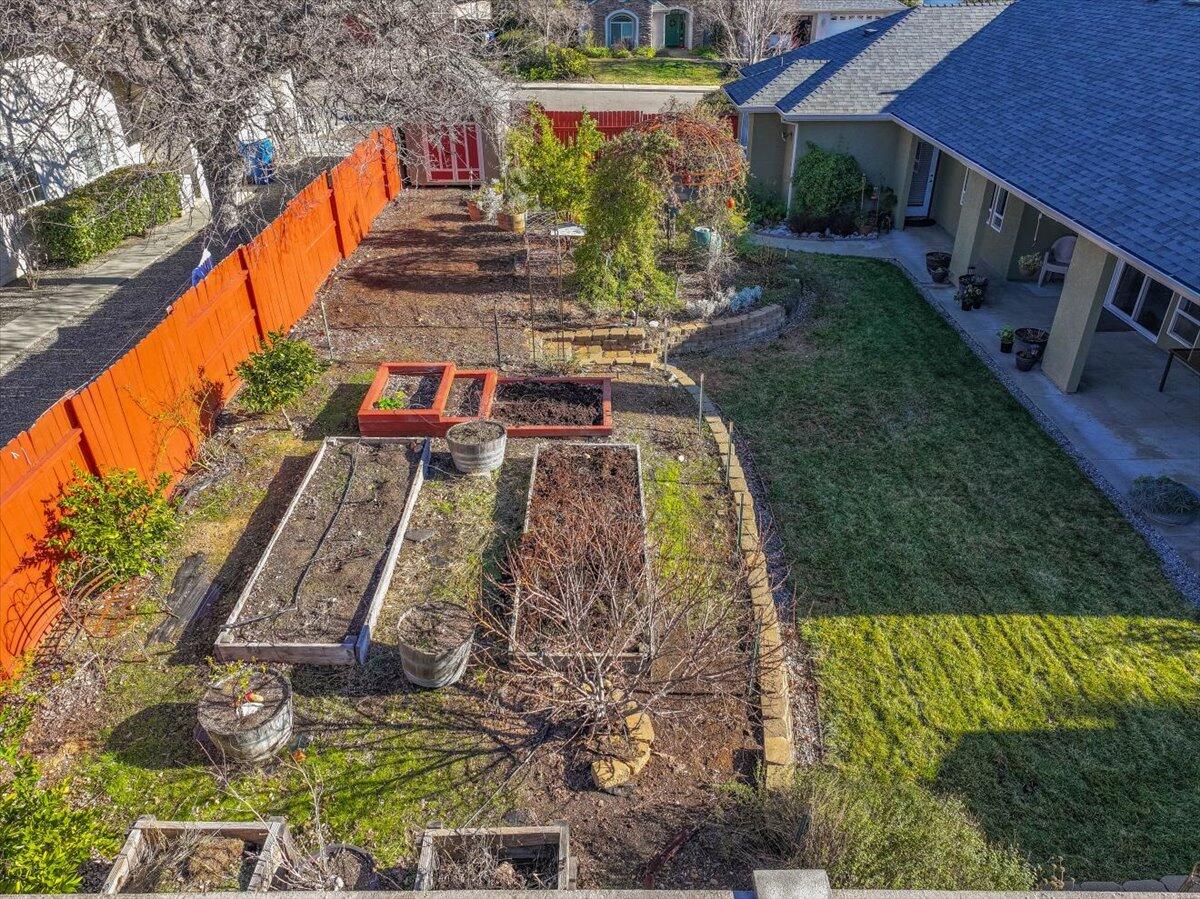 2122 Edinburgh Way Redding, CA 96003 - Photo 38 of 61 a view of a yard with plants