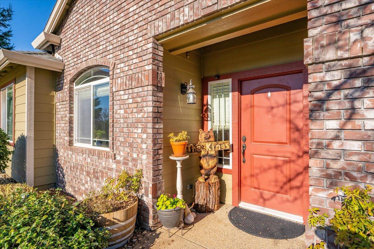 2122 Edinburgh Way Redding, CA 96003 - Photo 47 of 61 a front view of a house