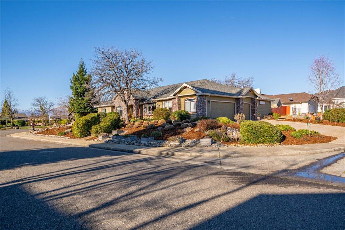 2122 Edinburgh Way Redding, CA 96003 - Photo 48 of 61 a view of a house with a street