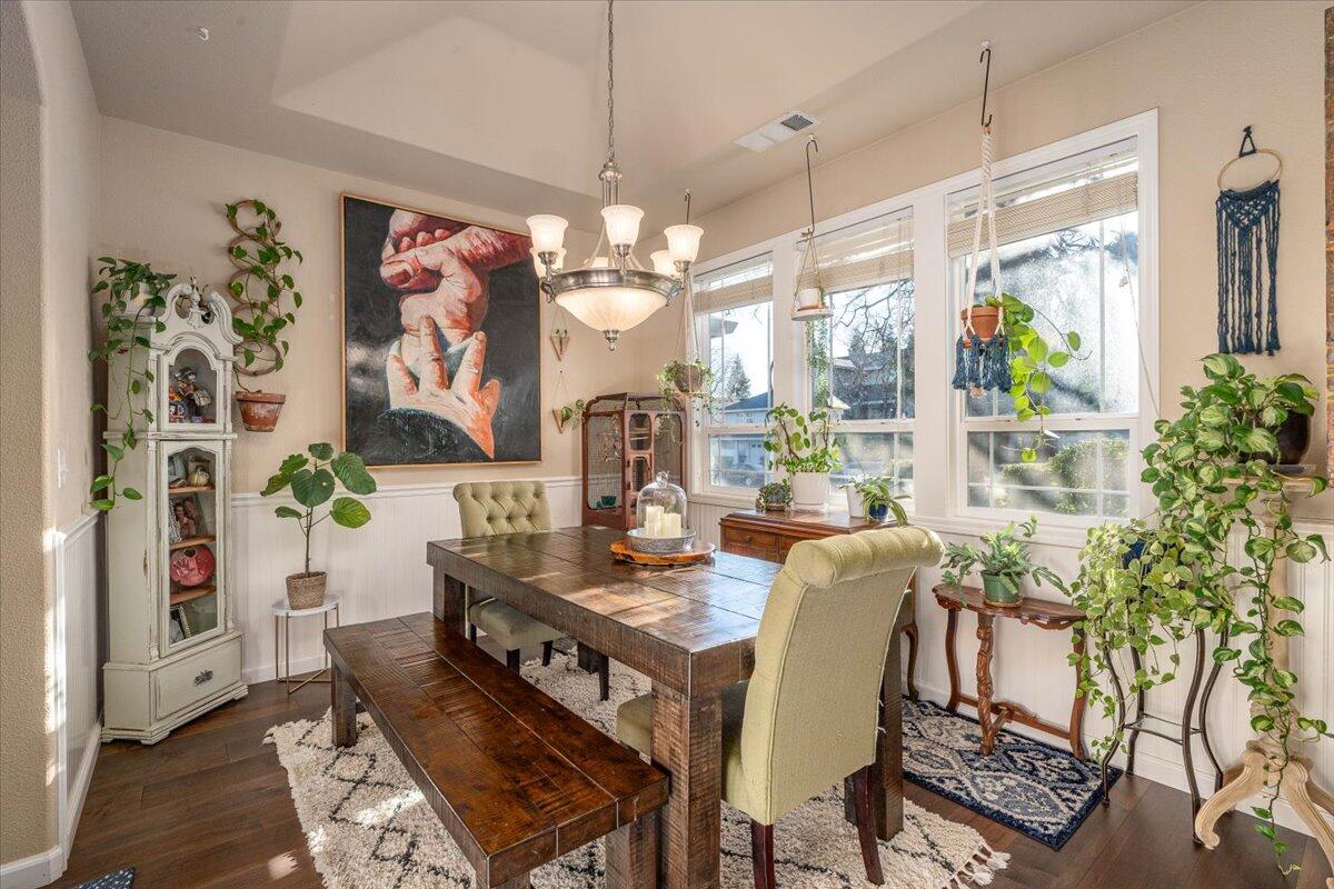 2122 Edinburgh Way Redding, CA 96003 - Photo 5 of 61 a view of a dining room with furniture window and outside view
