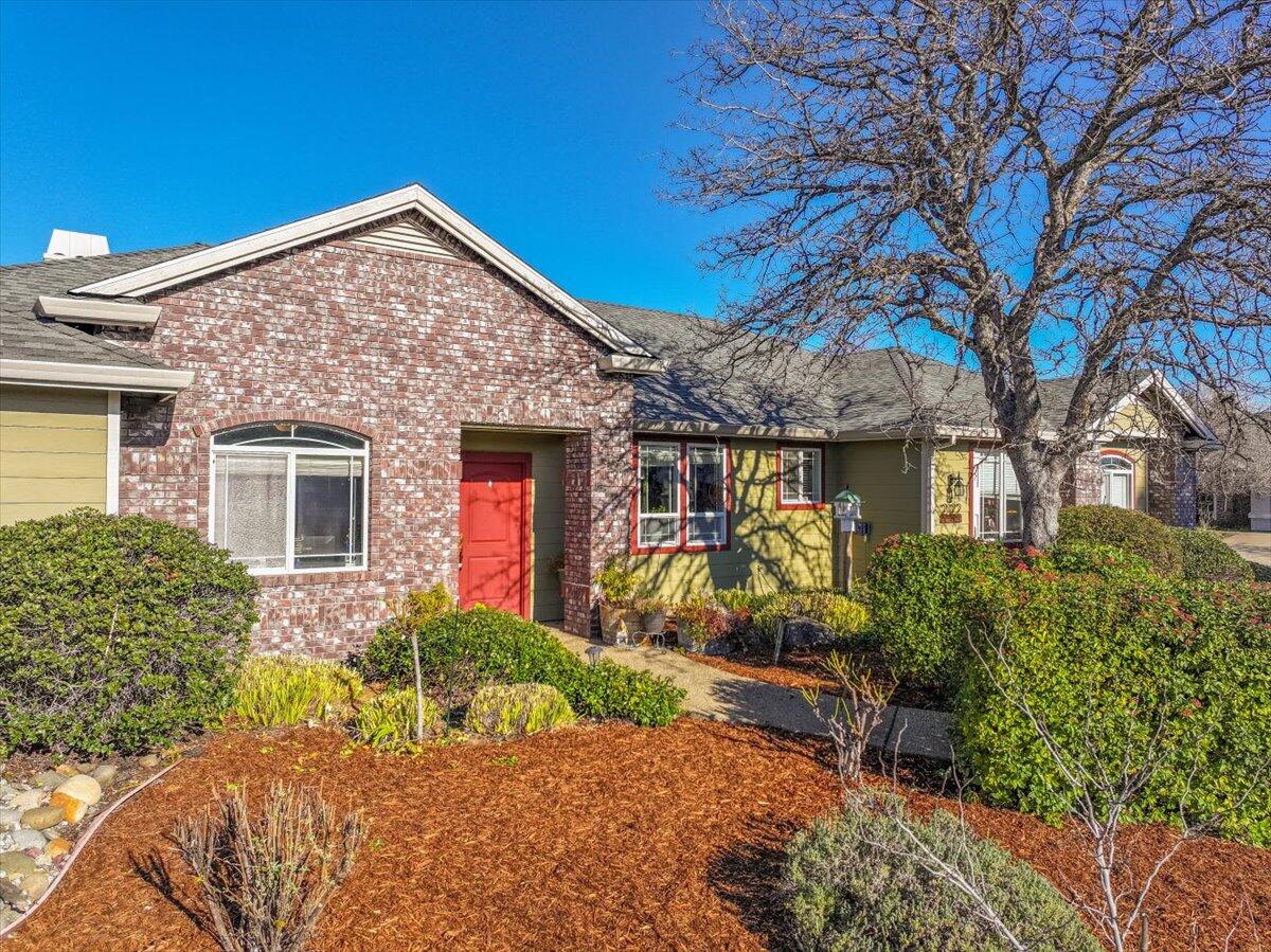 2122 Edinburgh Way Redding, CA 96003 - Photo 51 of 61 front view of a house with a yard
