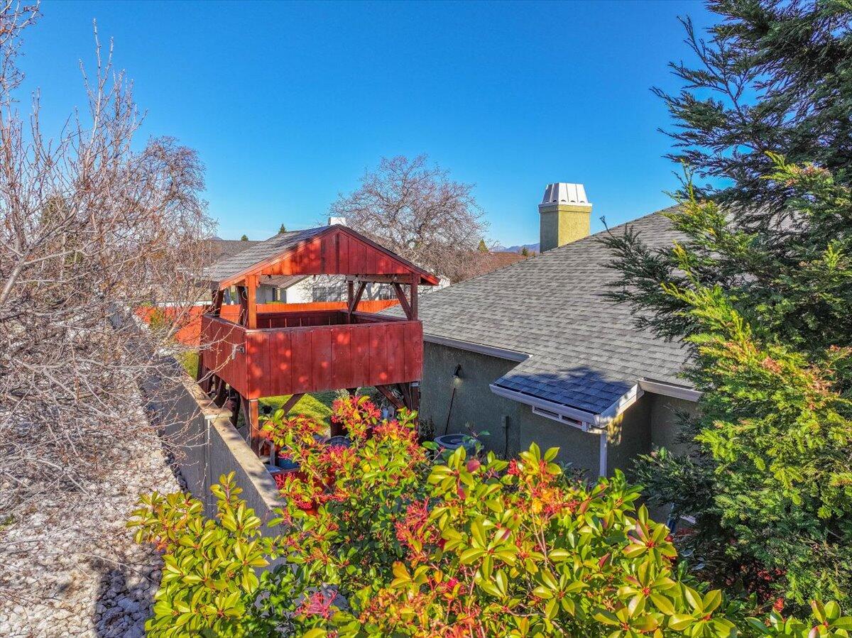 2122 Edinburgh Way Redding, CA 96003 - Photo 53 of 61 a front view of a house with a yard