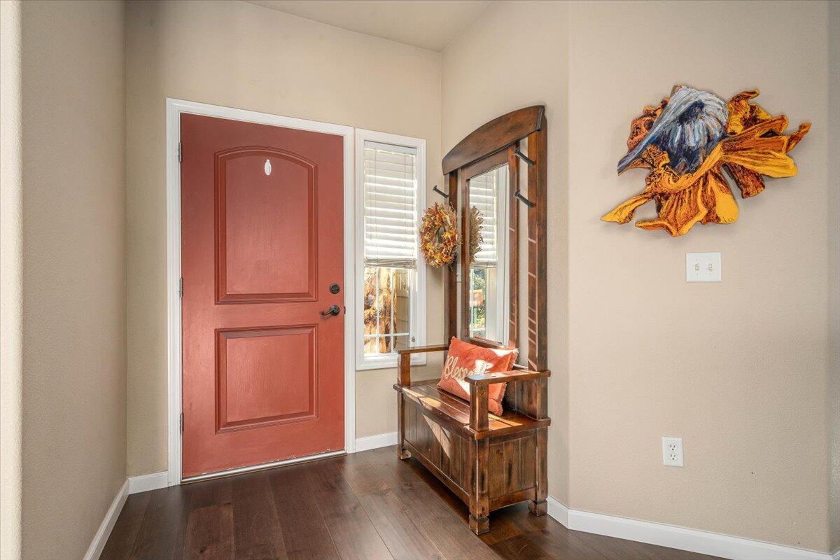 2122 Edinburgh Way Redding, CA 96003 - Photo 8 of 61 an entryway with wooden floor and a window