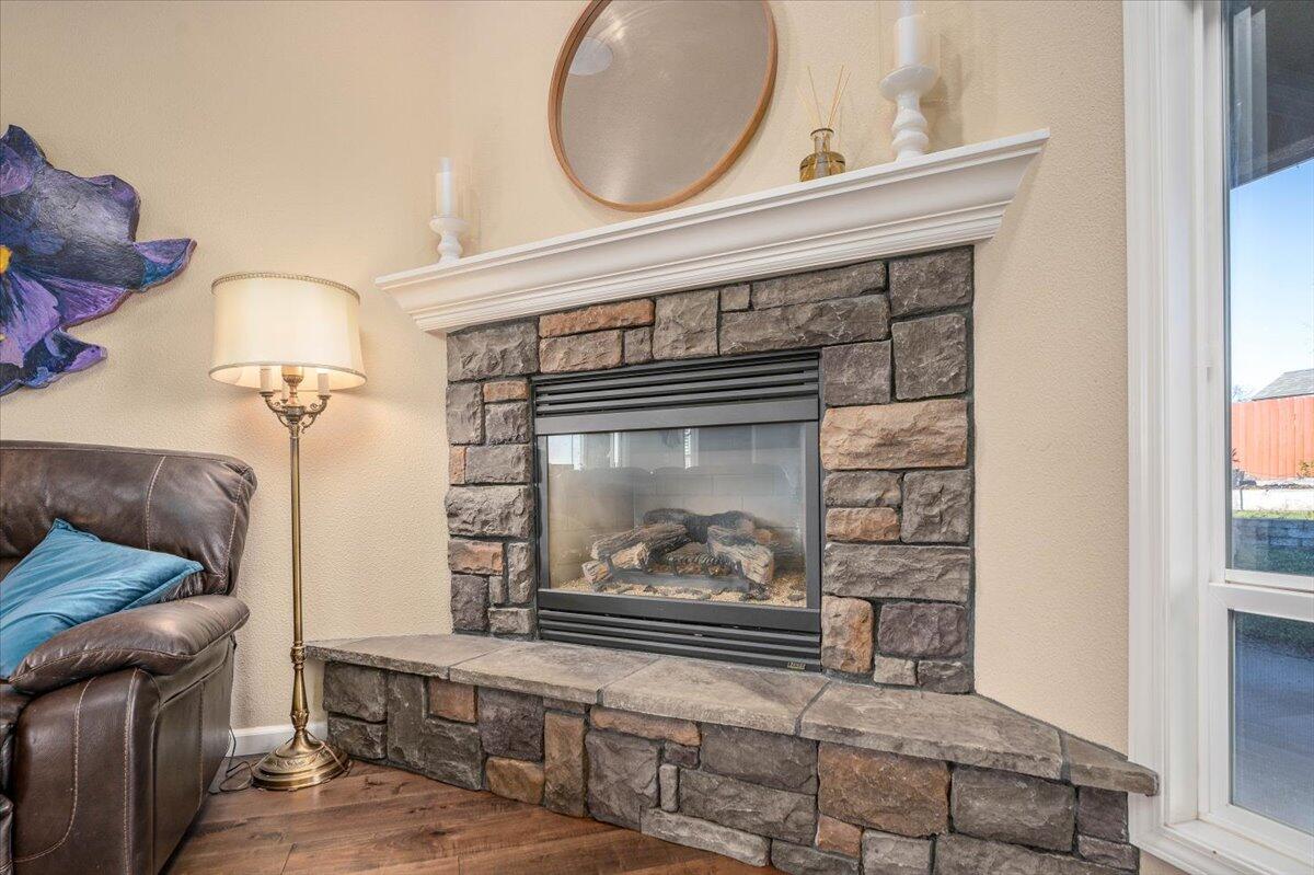 2122 Edinburgh Way Redding, CA 96003 - Photo 10 of 61 a view of living room with furniture and a fireplace