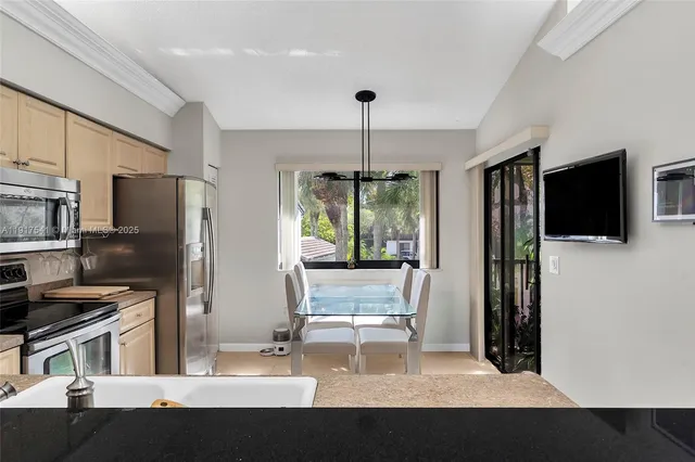 a room with furniture and a flat screen tv