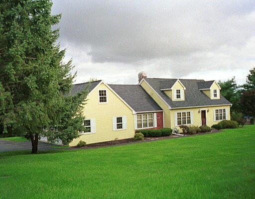 a view of outdoor space yard and front view of a house