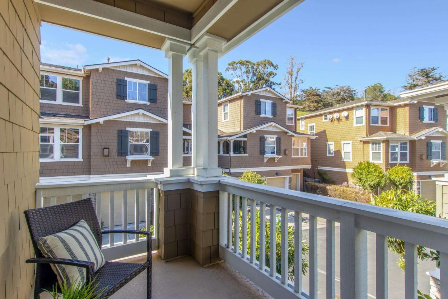 100 Live Oak Way, Unit 104 Belmont, CA 94002 - Photo 31 of 37 a view of a building from a balcony