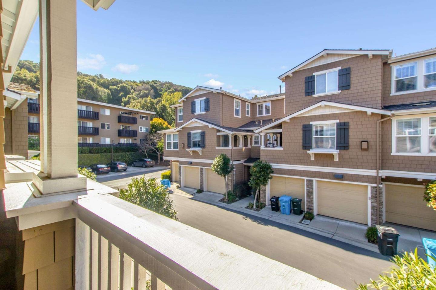 100 Live Oak Way, Unit 104 Belmont, CA 94002 - Photo 33 of 37 a front view of a house with a porch