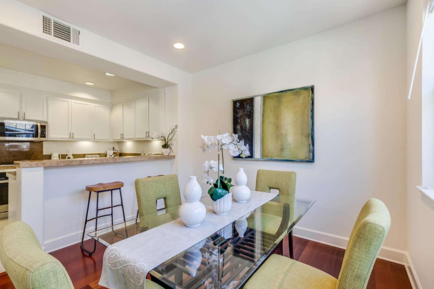 100 Live Oak Way, Unit 104 Belmont, CA 94002 - Photo 10 of 37 a view of a dining room with furniture