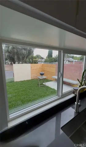 a view of a large window with an outdoor view