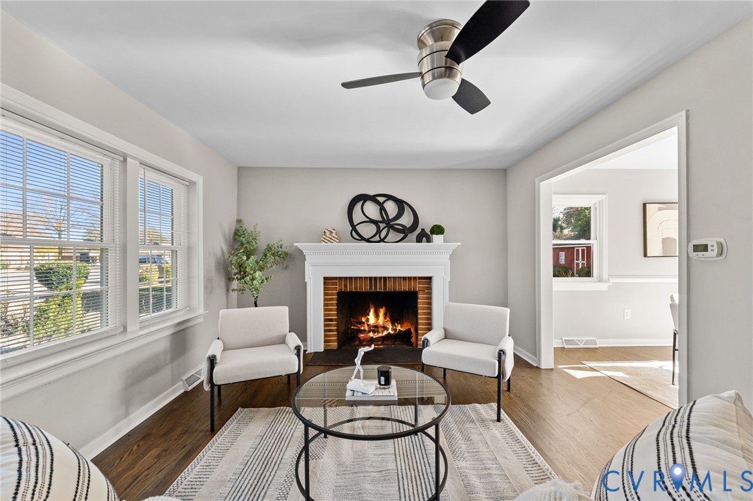 8005 Three Chopt Road Henrico, VA 23229 - Photo 4 of 28 a living room with furniture and a fireplace