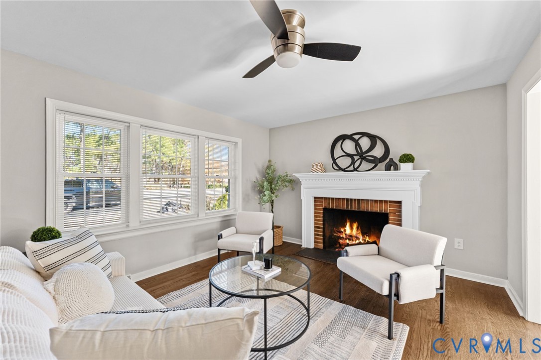 8005 Three Chopt Road Henrico, VA 23229 - Photo 5 of 28 a living room with furniture and a fireplace
